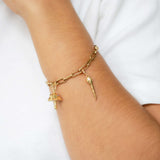 Tadpole Charm in 18K Gold made with White Diamond wear on