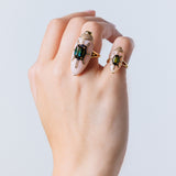 Scarab Ring in 18K gold with pink opal tourmaline, and diamonds — wear on close up 2 rings